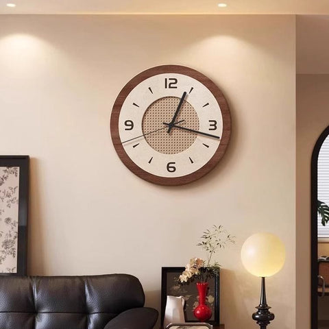 Wooden wall clock on a wall in a living room setting